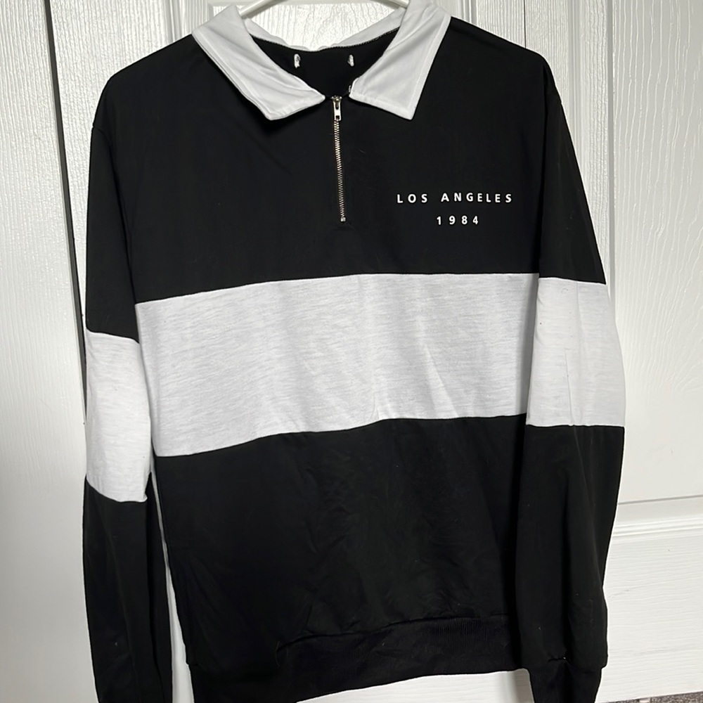 black collared quarter zip
